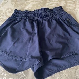 Lululemon running shorts. Navy blue. Size 6. NEVER WORN